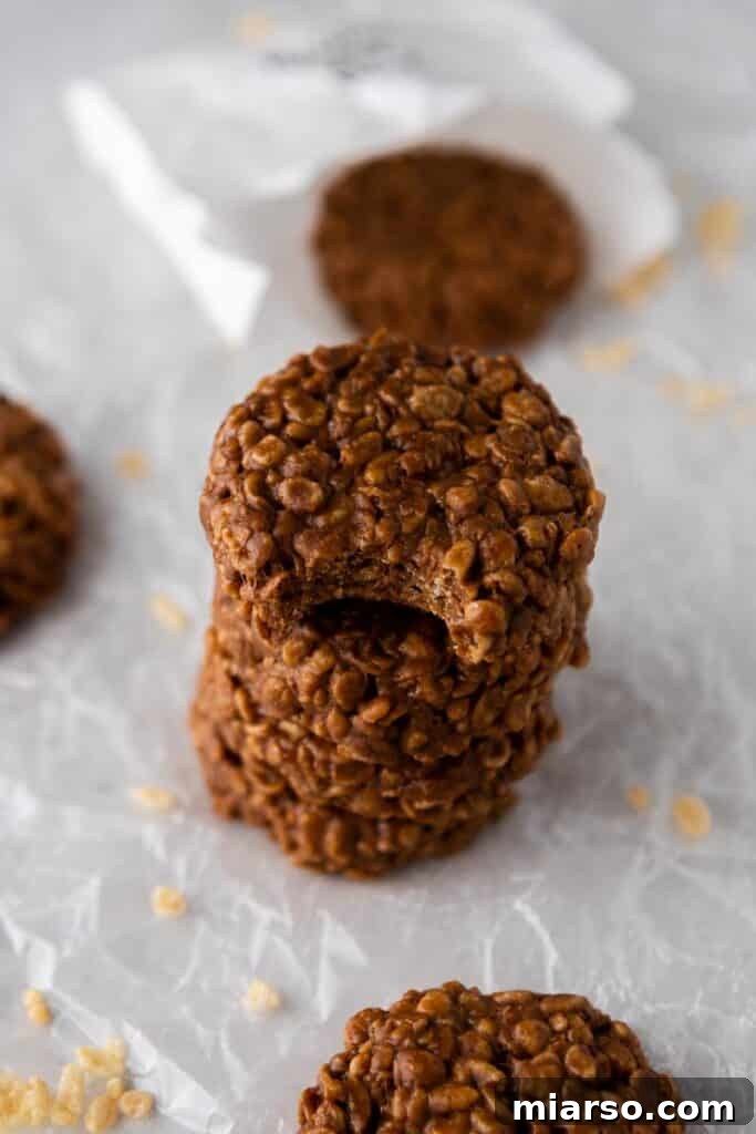 A stack of perfectly crafted Crumbl chocolate crunch cookies.
