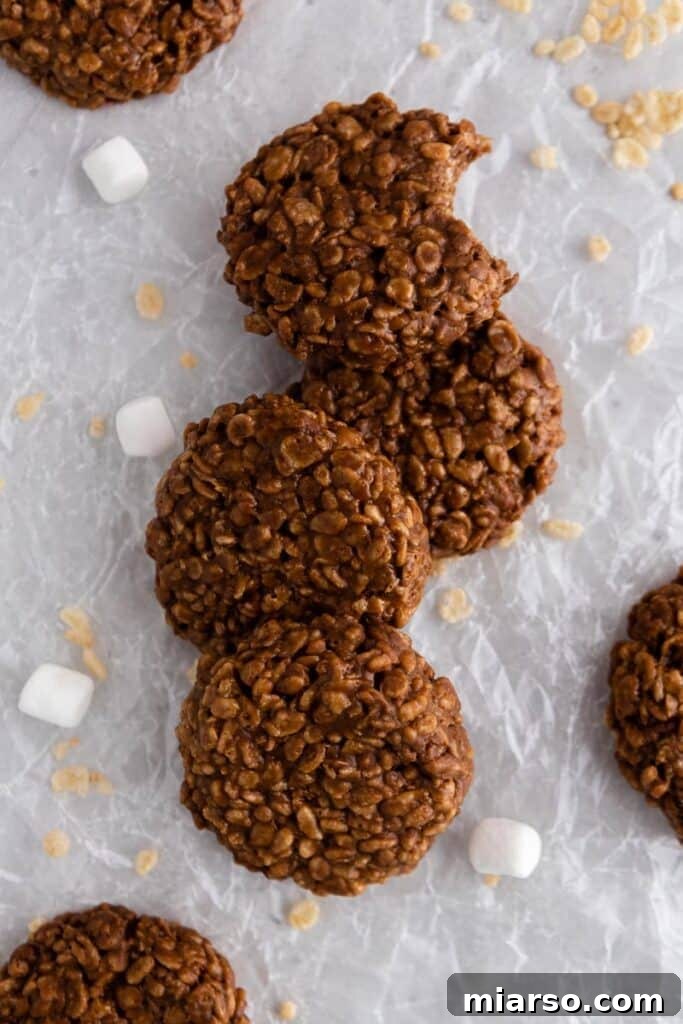 Close-up of freshly made Crumbl chocolate crunch cookies.