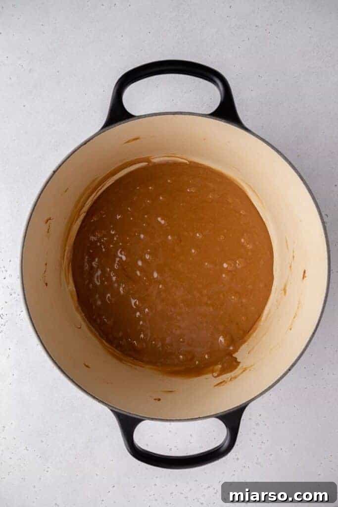Melted chocolate and marshmallows in a pot.