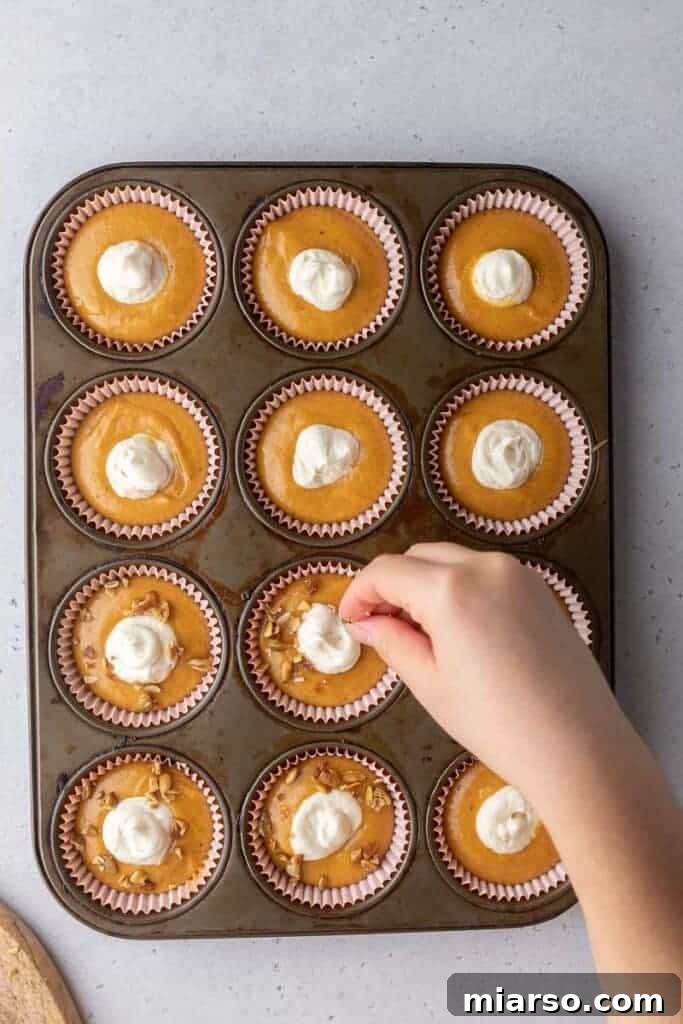 Muffin batter in muffin tin
