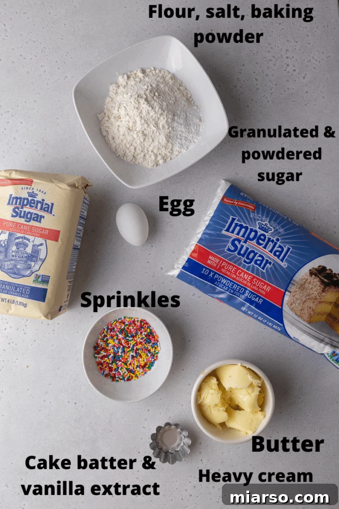 Crumbl funfetti milkshake cookie ingredients laid out on a table, including butter, sugars, flour, and sprinkles.