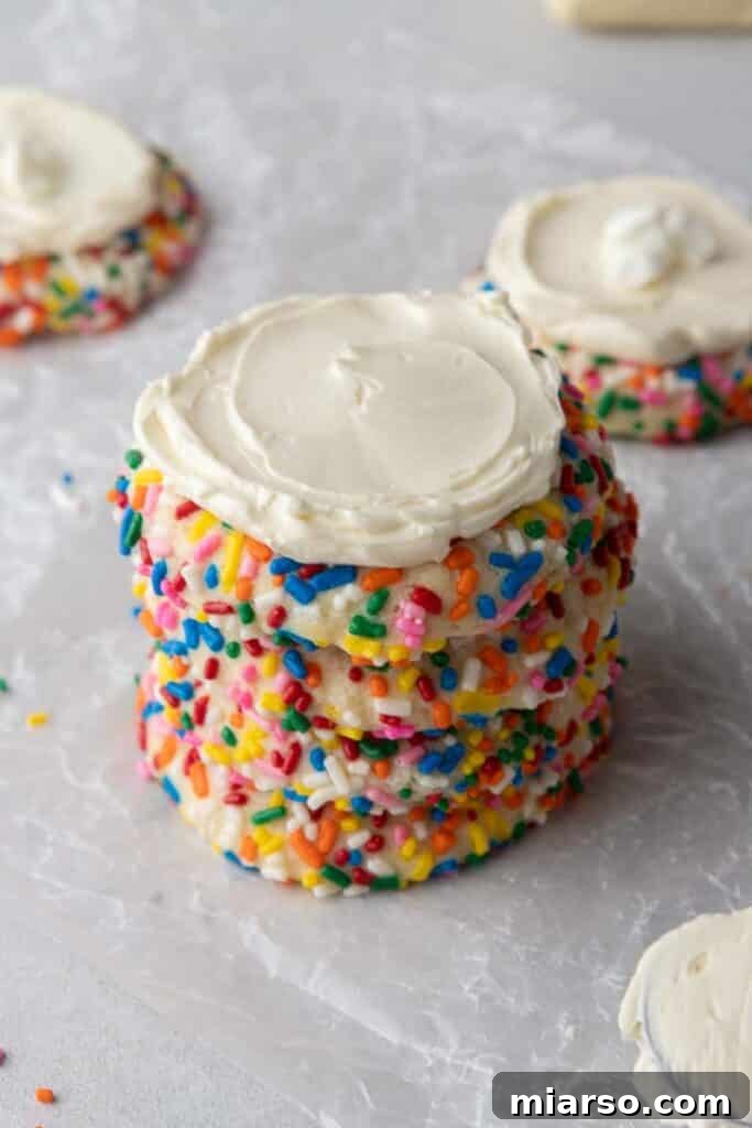 Another stack of Crumbl funfetti cookies with buttercream, ready to be served.