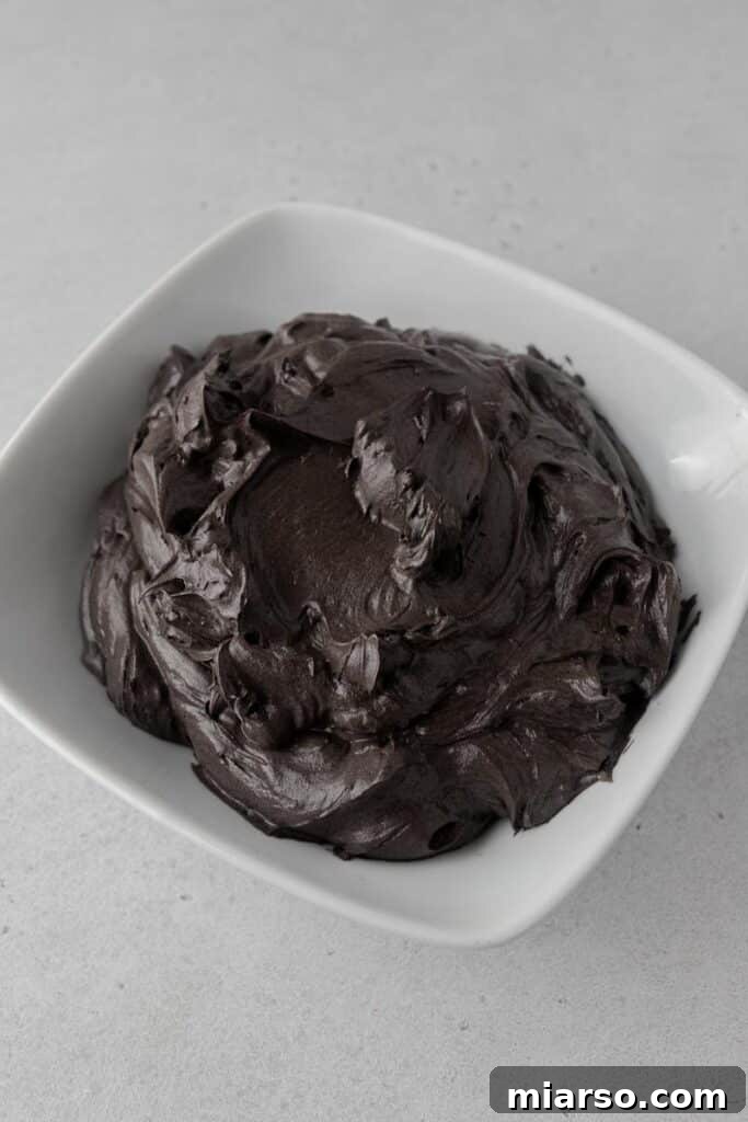 Midnight Velvet Monster Cupcakes 14 Black cocoa swiss meringue buttercream