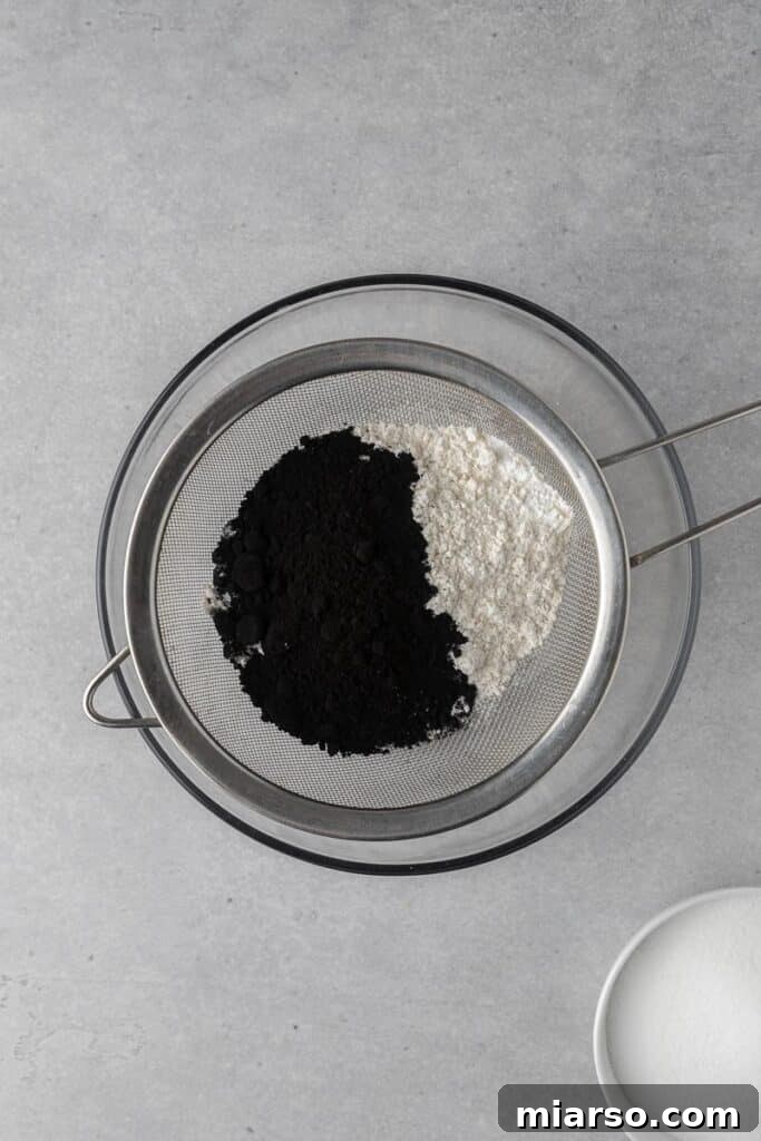 Midnight Velvet Monster Cupcakes 4 Sifting dry ingredients
