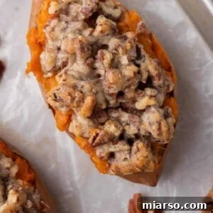 Pecan Pie Twice-Baked Sweet Potato Delight 13 Pecan pie twice baked sweet potato with creamy maple mashed filling and chunky cinnamon pecan streusel baked until golden and bubbling