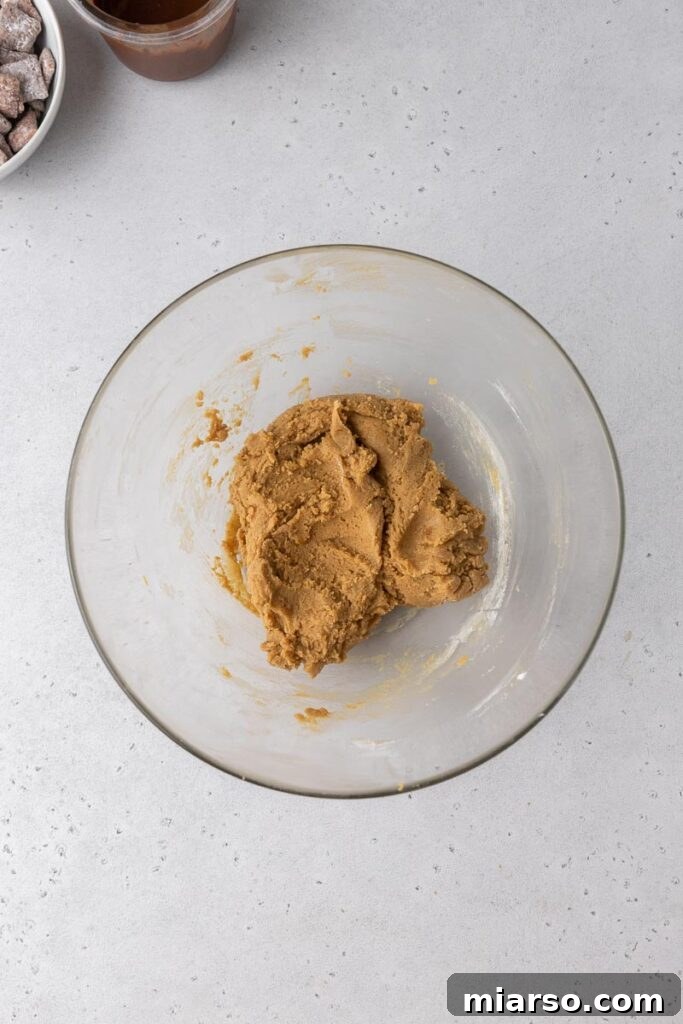 Scooped peanut butter cookie dough ready for shaping.
