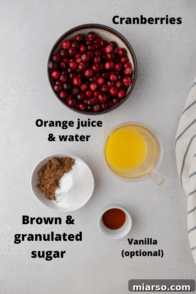Fresh ingredients for homemade cranberry orange sauce, including cranberries, oranges, and sugars.