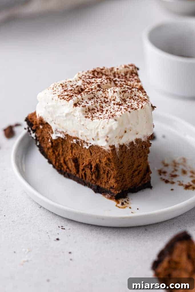 No bake chocolate pie with oreo crust, a decadent and easy Thanksgiving dessert.