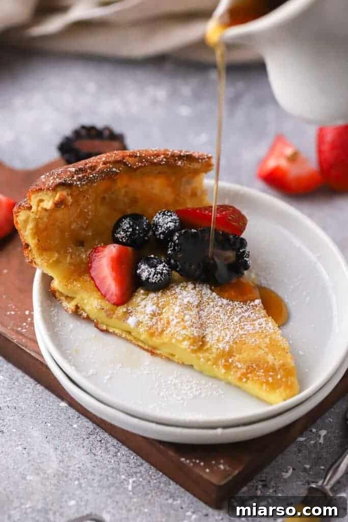 Easy Family Style Dutch Baby Pancake recipe, a quick and impressive breakfast.
