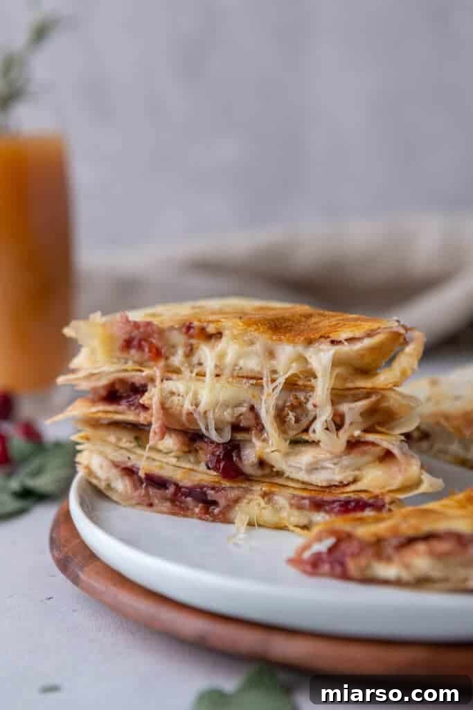Cheesy Thanksgiving turkey quesadillas, a perfect way to use holiday leftovers.