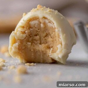 Golden Oreo Cheesecake Truffles 11 Golden Oreo truffles, beautifully coated in white chocolate.