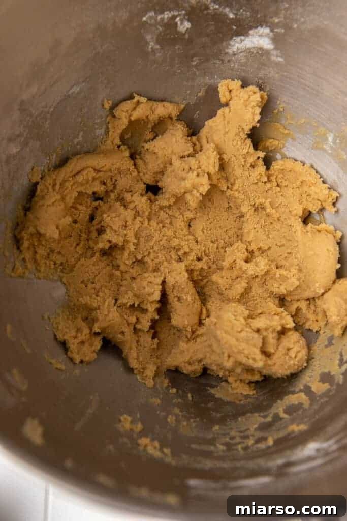 Crumbl Sticky Bun Cookie Perfection 5 Soft cookie dough in mixing bowl