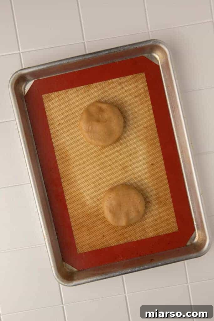 Crumbl Sticky Bun Cookie Perfection 7 Sticky bun cookie dough filled and shaped