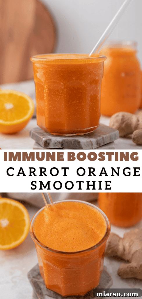 Golden Immunity Zest Smoothie 10 A tall glass of vibrant carrot orange smoothie, perfect for pinning on Pinterest as a healthy drink idea.