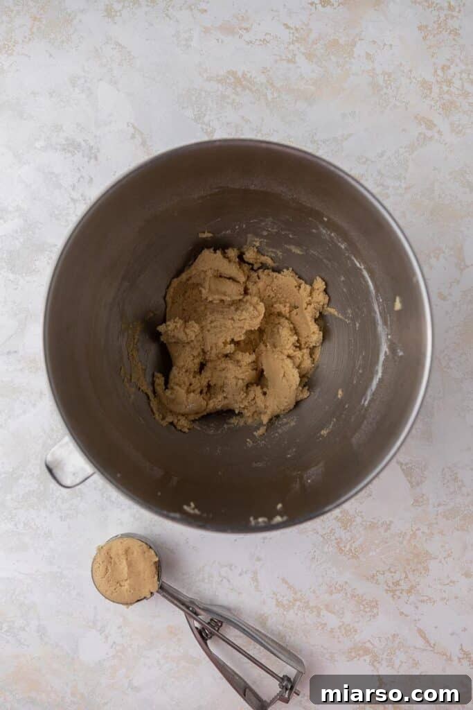 Honey bun cookie dough in mixing bowl