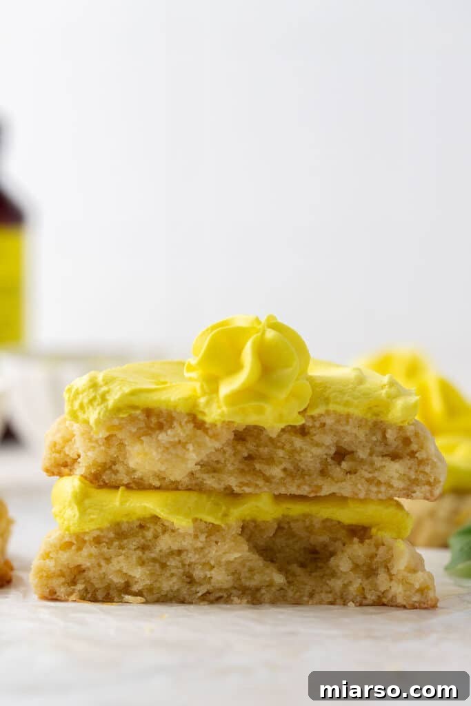 Crumbl's Pineapple Dole Whip Paradise Cookies 11 Frosted pineapple cookie split in half