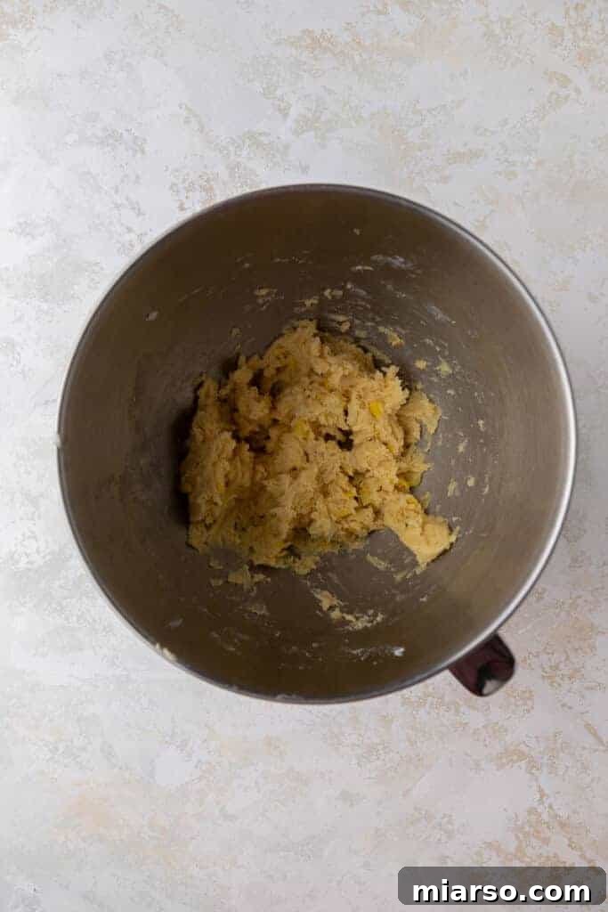 Crumbl's Pineapple Dole Whip Paradise Cookies 6 Pineapple cookie dough in mixing bowl