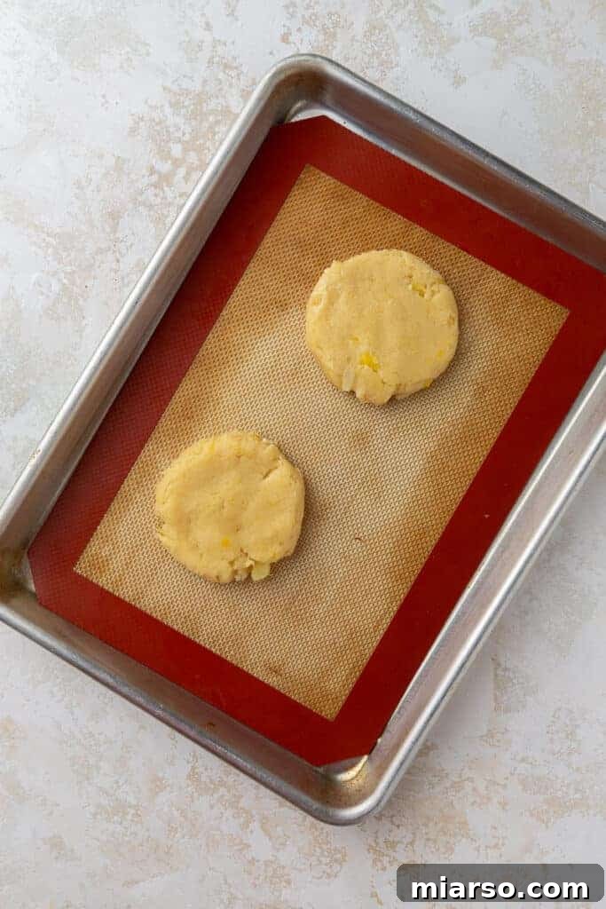 Crumbl's Pineapple Dole Whip Paradise Cookies 7 Pineapple cookie dough on baking sheet