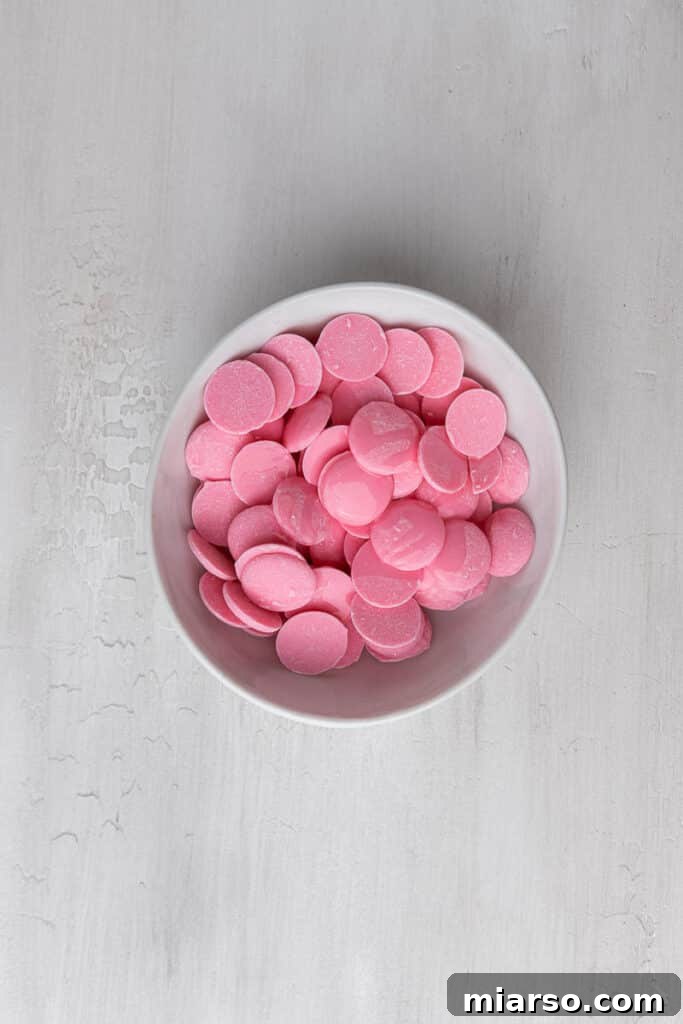 Cupid's Crunch 4 A bowl of melted pink candy melts, ready to coat the cereal.