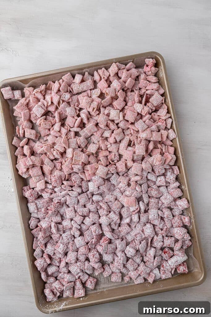 Cupid's Crunch 8 Another view of pink muddy buddies setting, showcasing their texture.