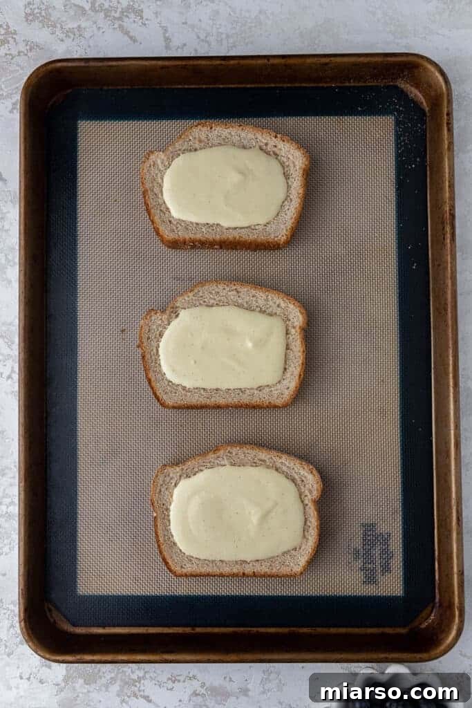Custard toast mixture on baking sheet