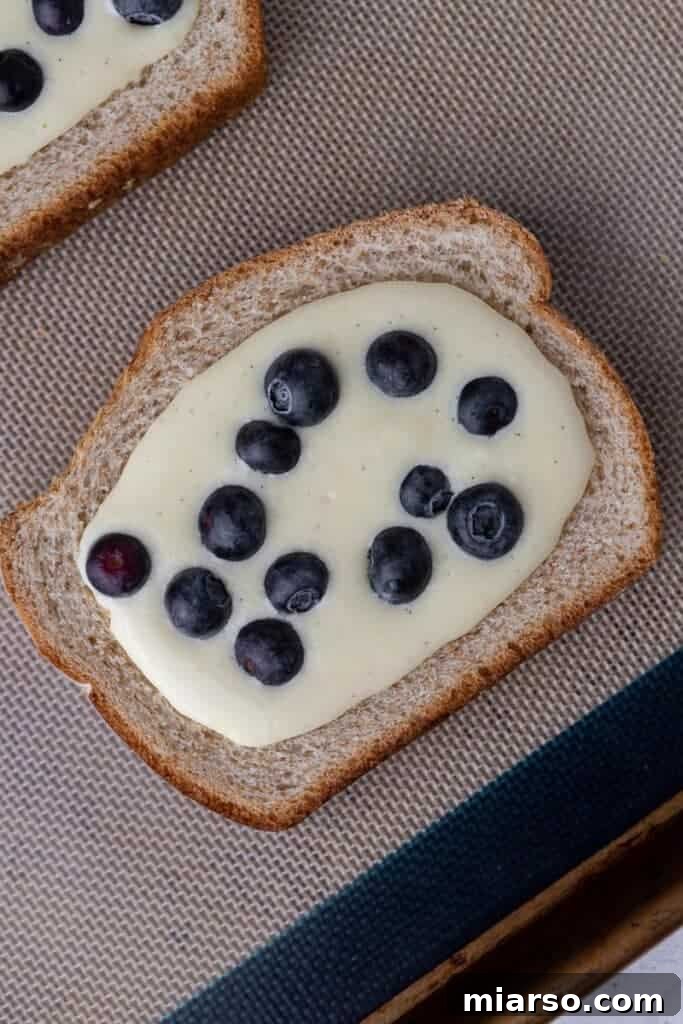 Custard toast on baking sheet before baking