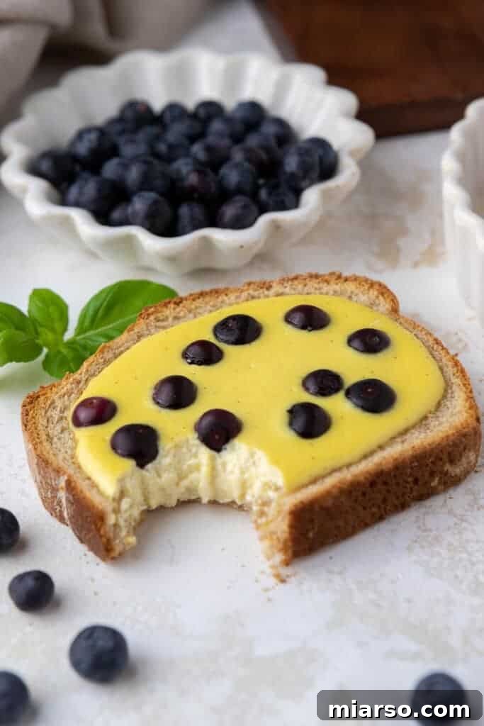 Oven baked yogurt toast with berries and honey drizzle