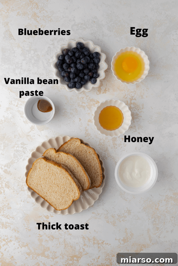 Ingredients for yogurt custard toast, including bread, yogurt, egg, honey, and vanilla bean paste