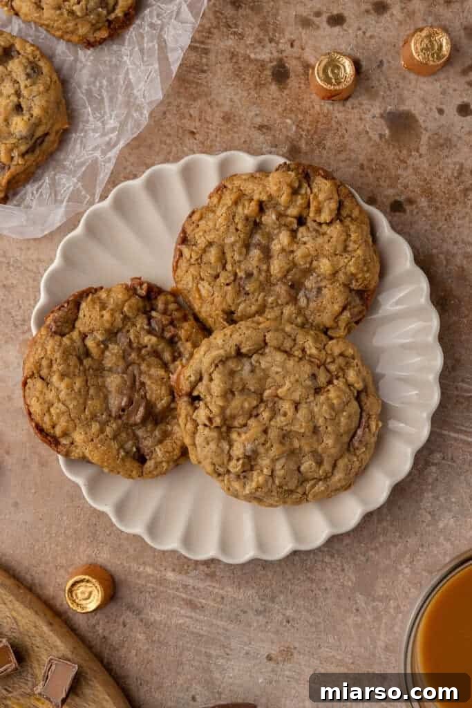 Close-up of freshly baked Crumbl Oatmeal Rolo Cookies