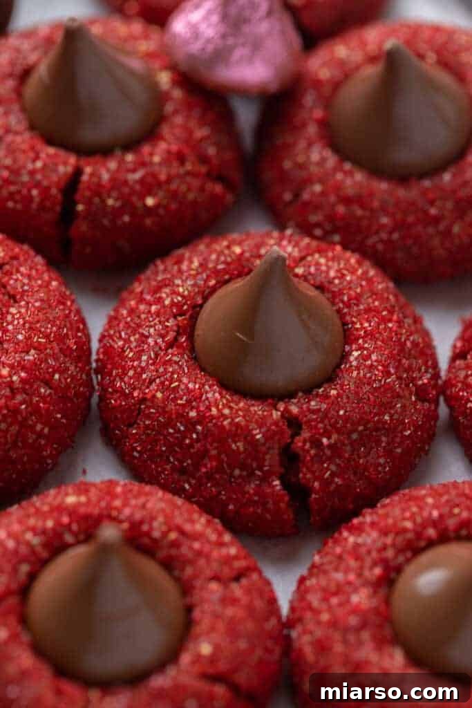 Hershey's Kissed Red Velvet Cookies 11 Close up of a single Hershey's red velvet blossom cookie, highlighting its rich color and texture