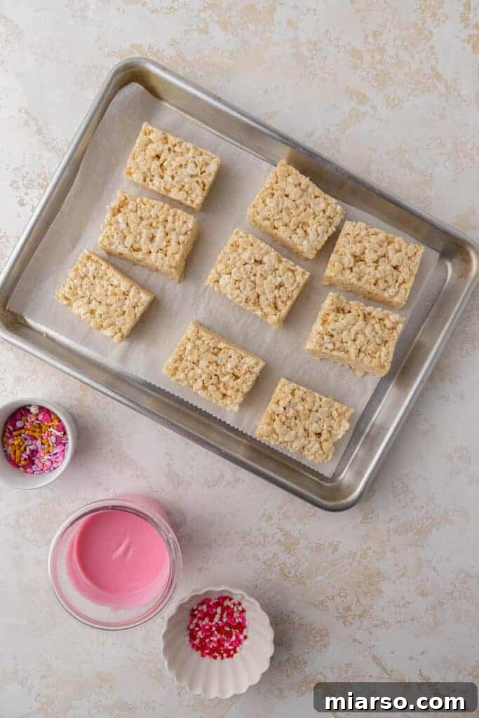 Sliced Rice Krispie treats ready for dipping