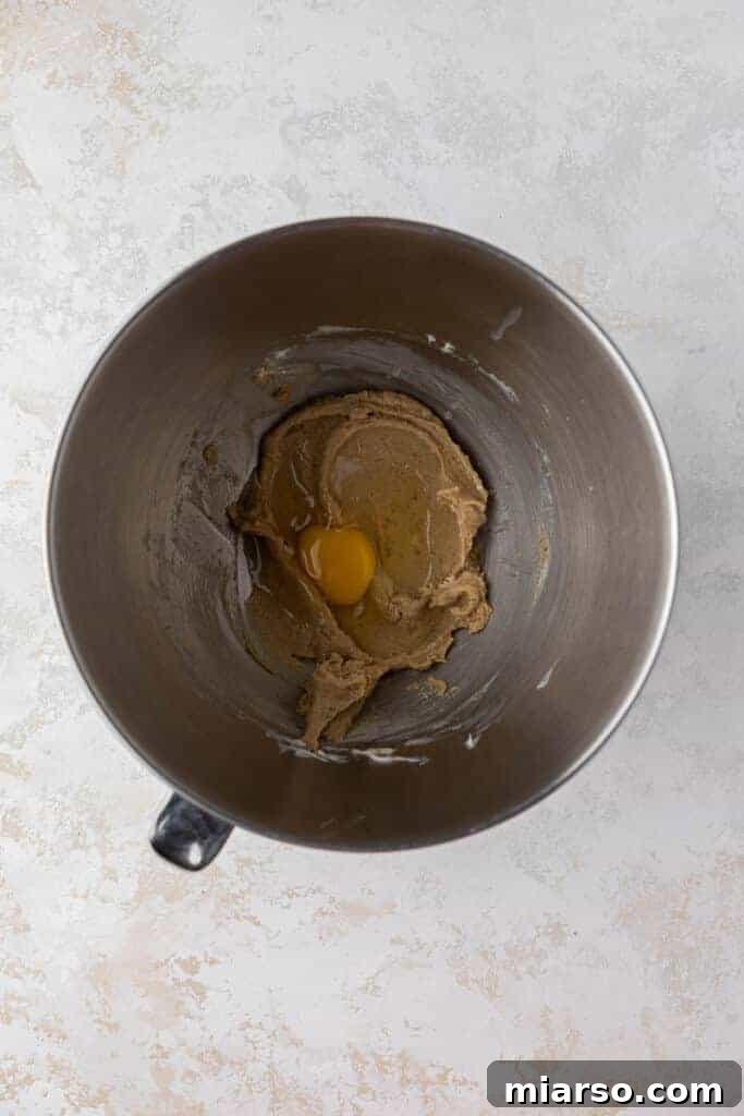 Creamed butter and sugars for S'mores cookies in a mixing bowl