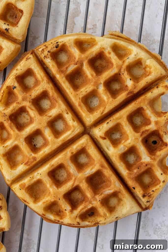 Simply Perfect Buttermilk Waffles 8 Close up of a crispy buttermilk waffle cooking