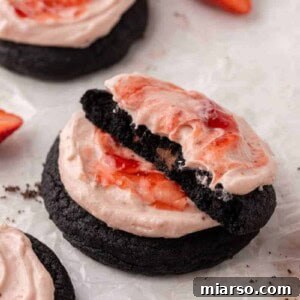 Chocolate strawberry cheesecake cookies, ready to be baked and frosted.