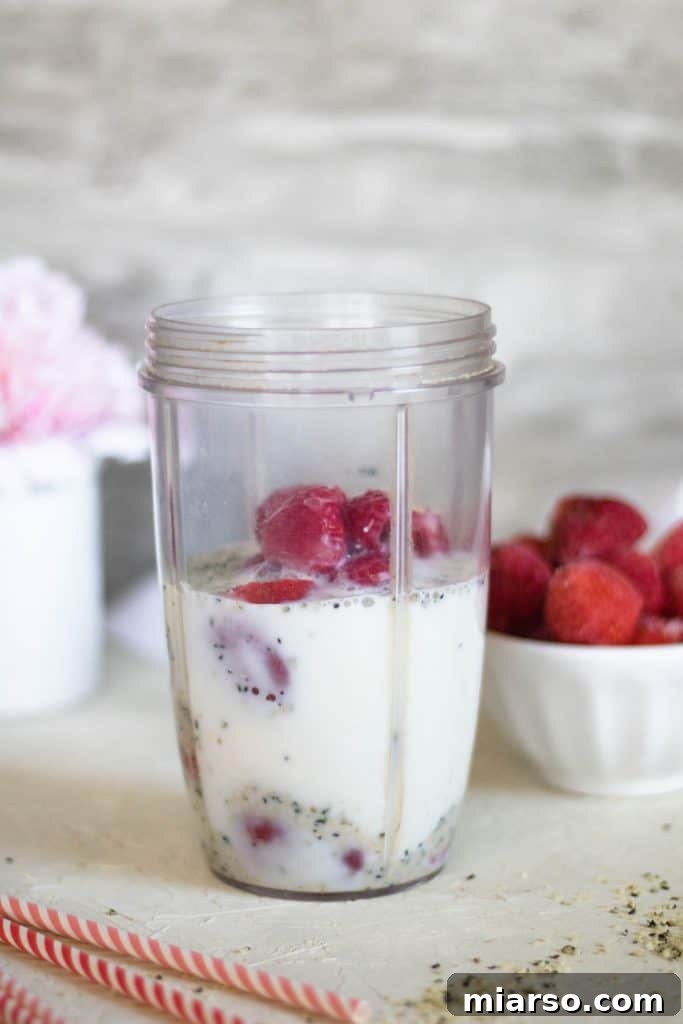 Valentine's day healthy smoothie ingredients in the blender