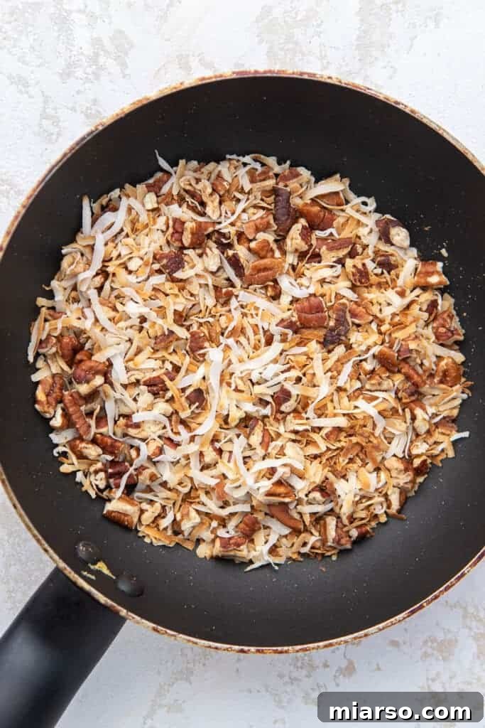 Toasted coconut and pecans for frosting