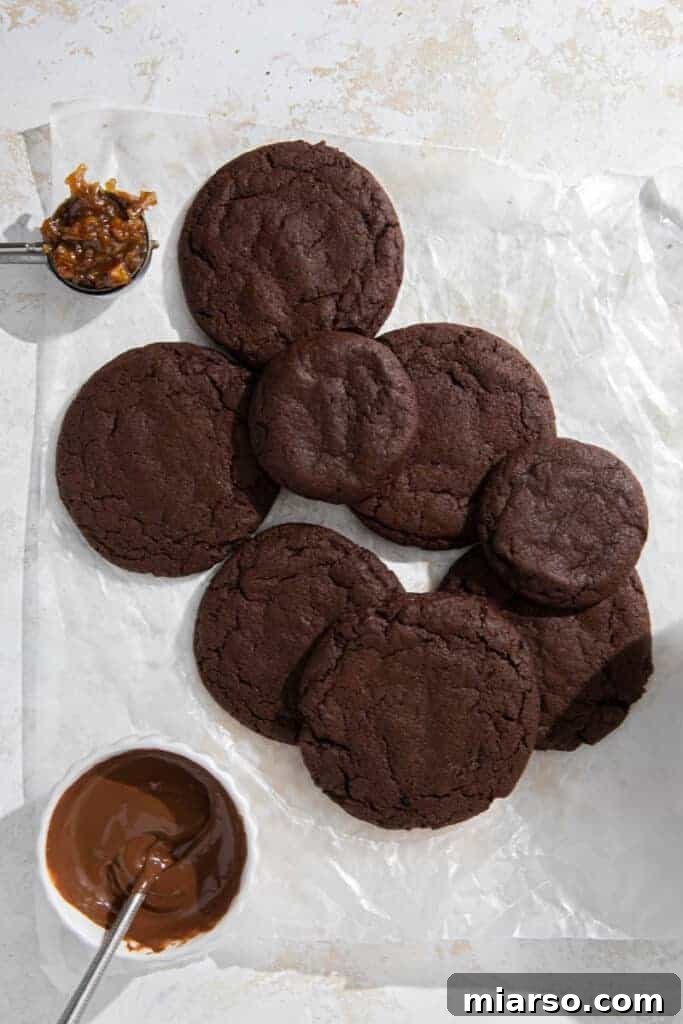 Freshly baked chocolate cookies on baking sheet