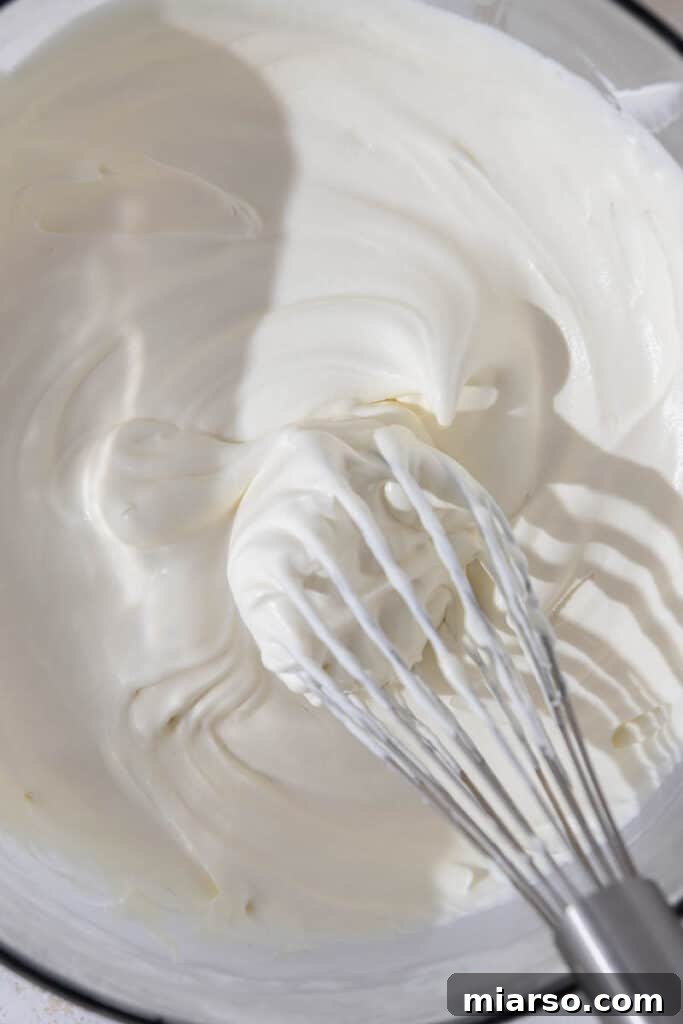 Whipped heavy cream in a bowl
