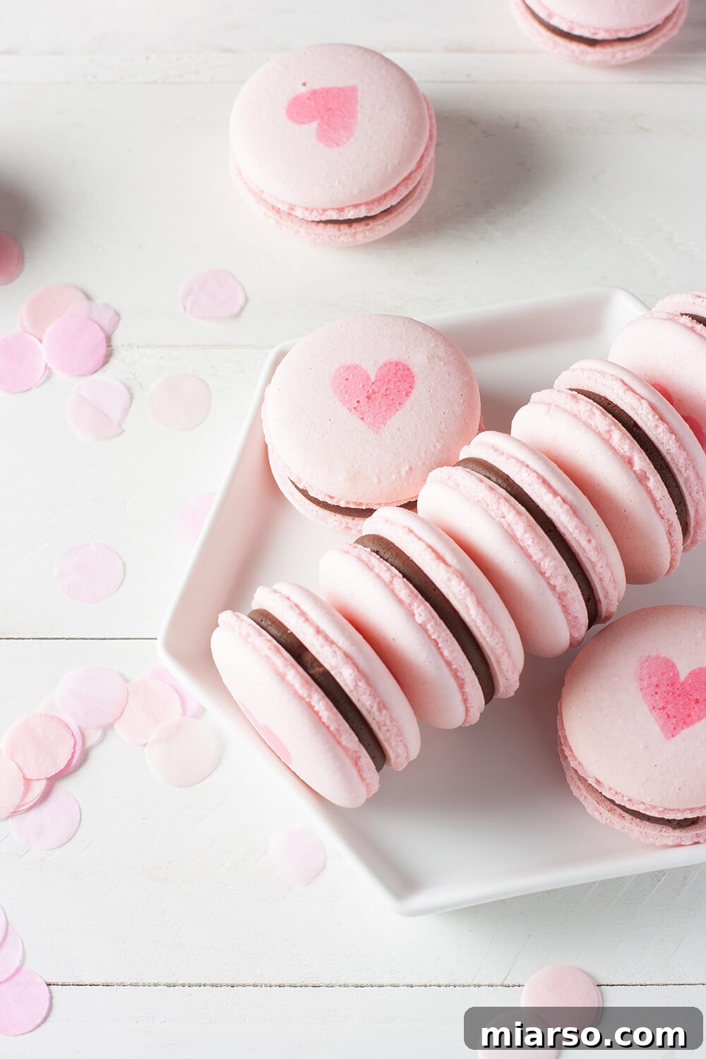 Elegant Pink Valentine's Day Macarons with chocolate ganache