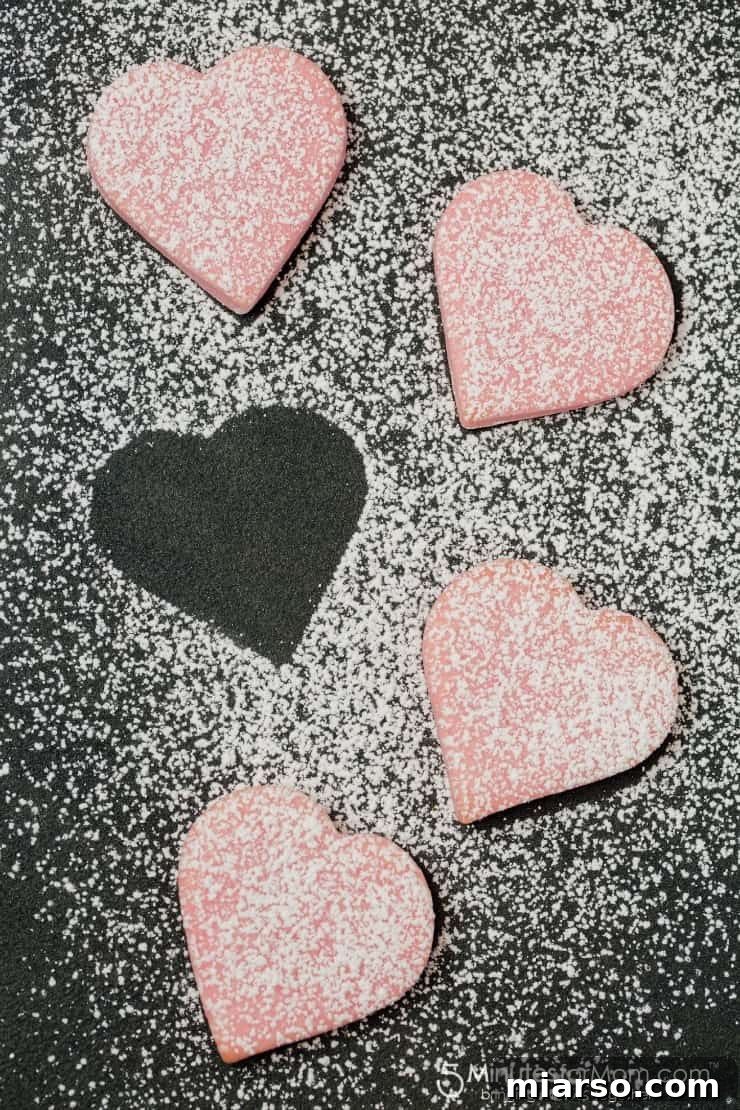 Quick and easy Valentine's Day sugar cookies dusted with powdered sugar