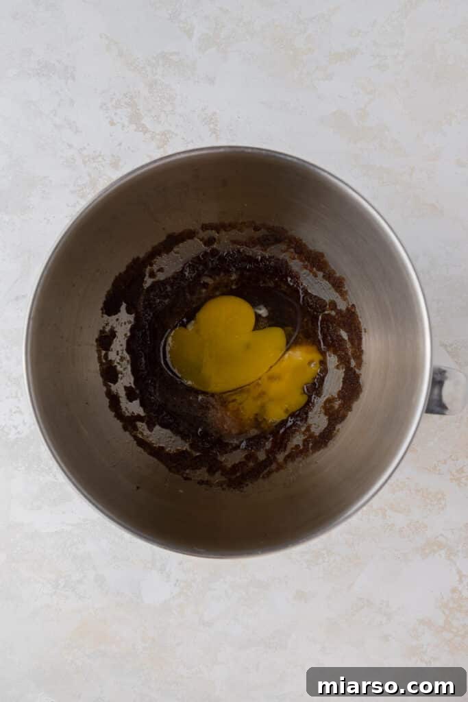 Creamed brown butter and brown sugar in a mixing bowl