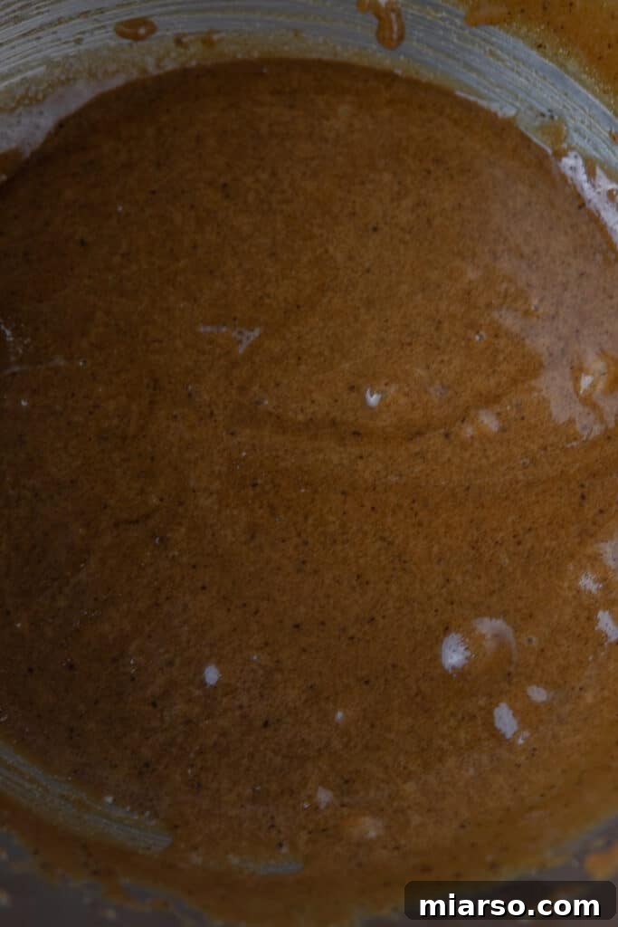 Light and fluffy blondie batter in mixing bowl
