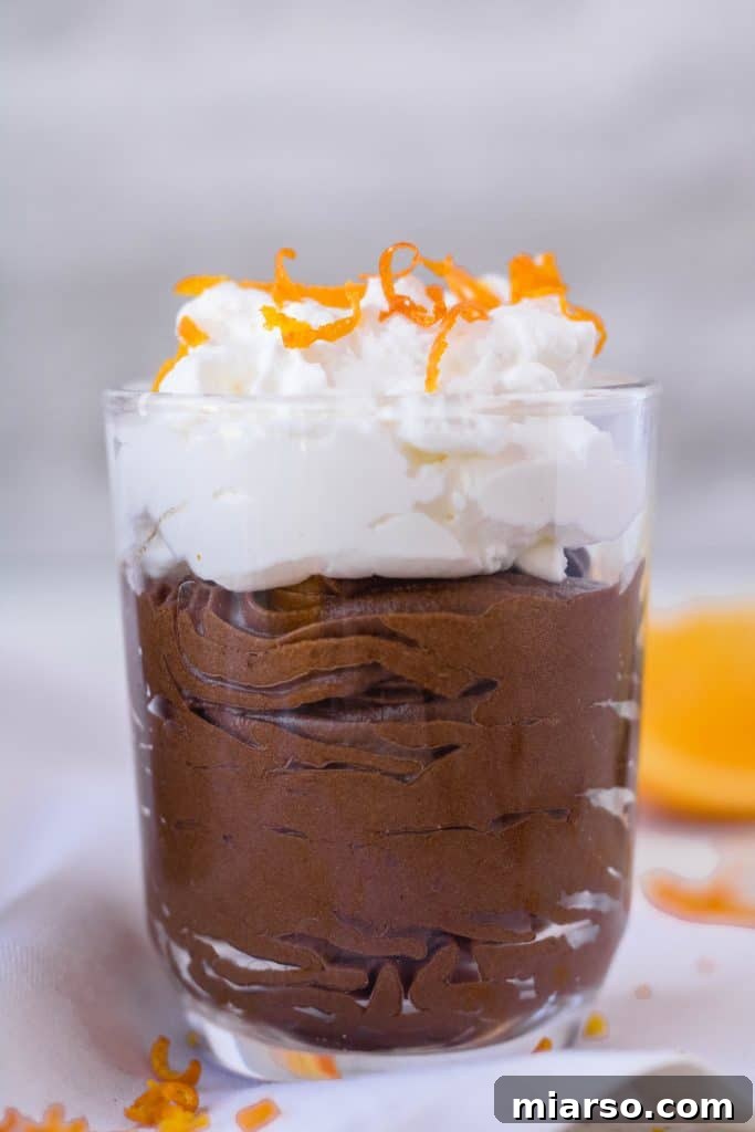 mini glass container with chocolate avocado orange mousse