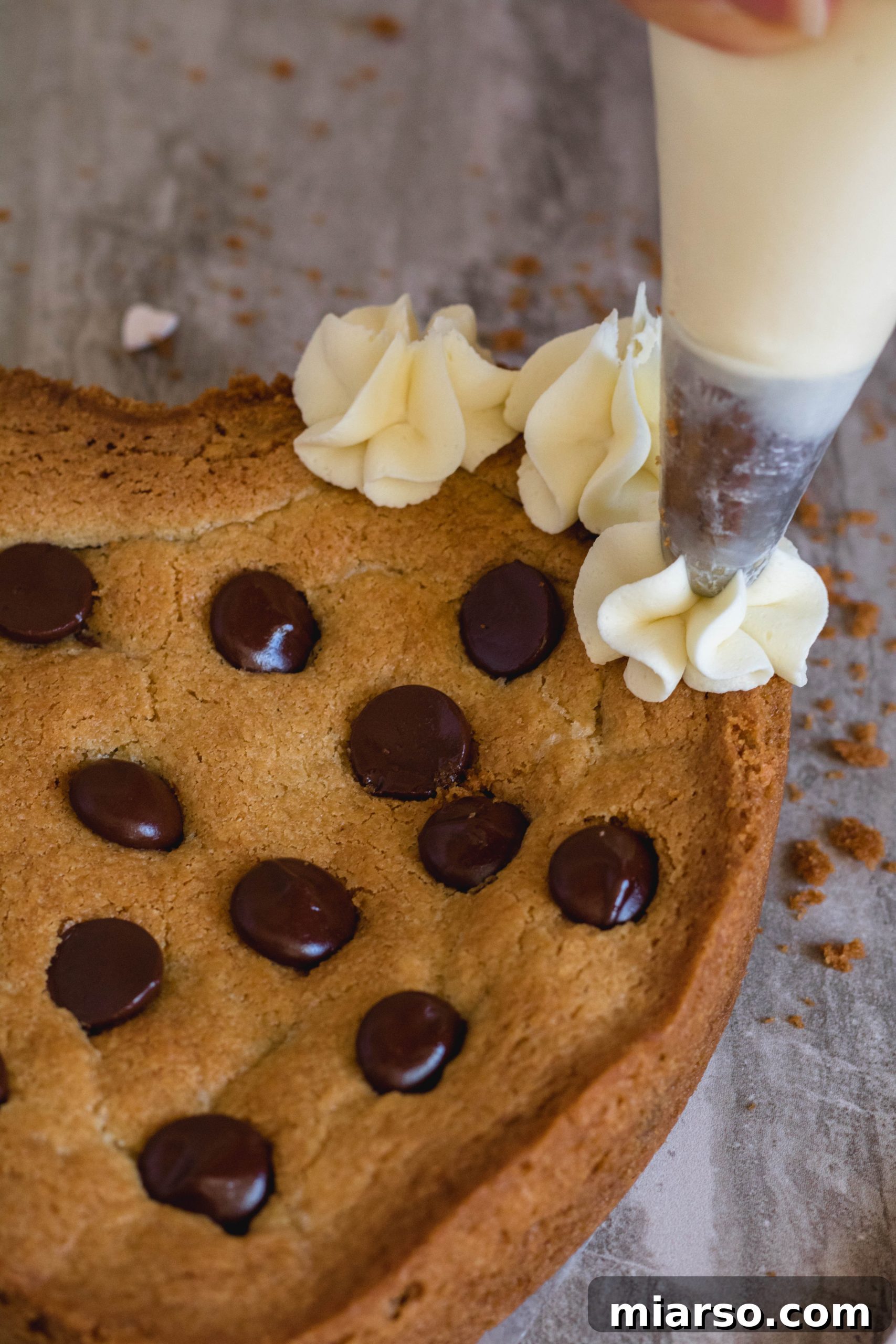 Valentines Day Heart Cookie Cake for Two 22 Piping the white chocolate ganache on the cookie