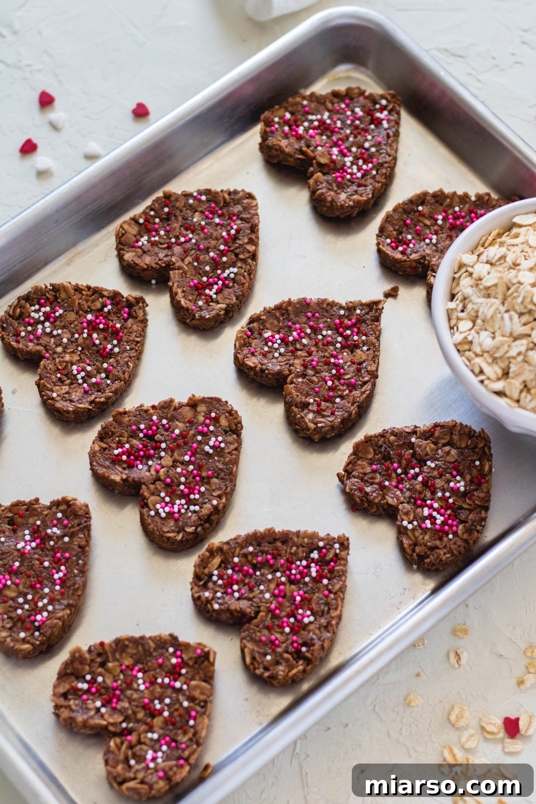 Healthy No Bake Cookies on baking sheet with oats