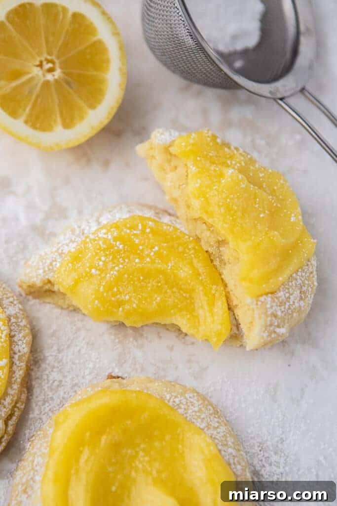 Lemon curd cookie broken in half