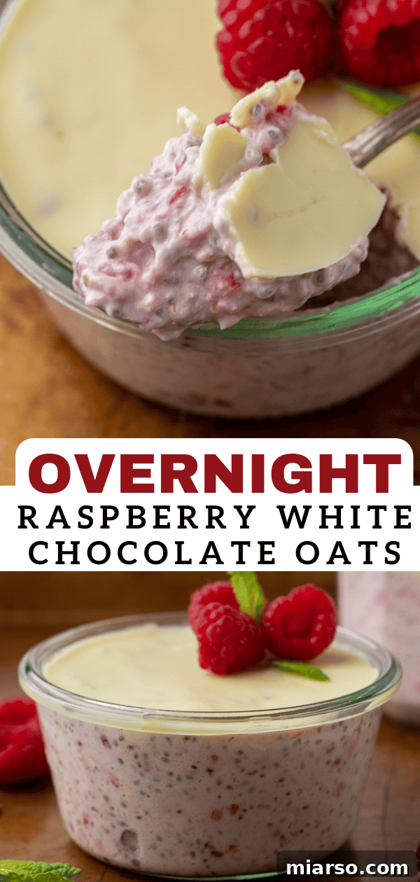 Overnight raspberry oats with a spoon breaking the chocolate layer.