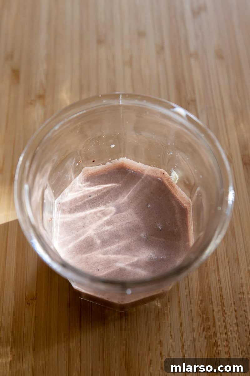 Mastering Starbucks Chocolate Cream Cold Brew at Home 5 Chocolate malted sweet cream being poured into a cup