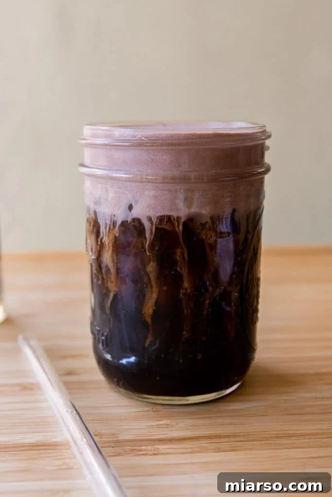 Mastering Starbucks Chocolate Cream Cold Brew at Home 7 Starbucks Chocolate Cream Cold Brew Copycat Recipe - A glass with cold brew and chocolate foam