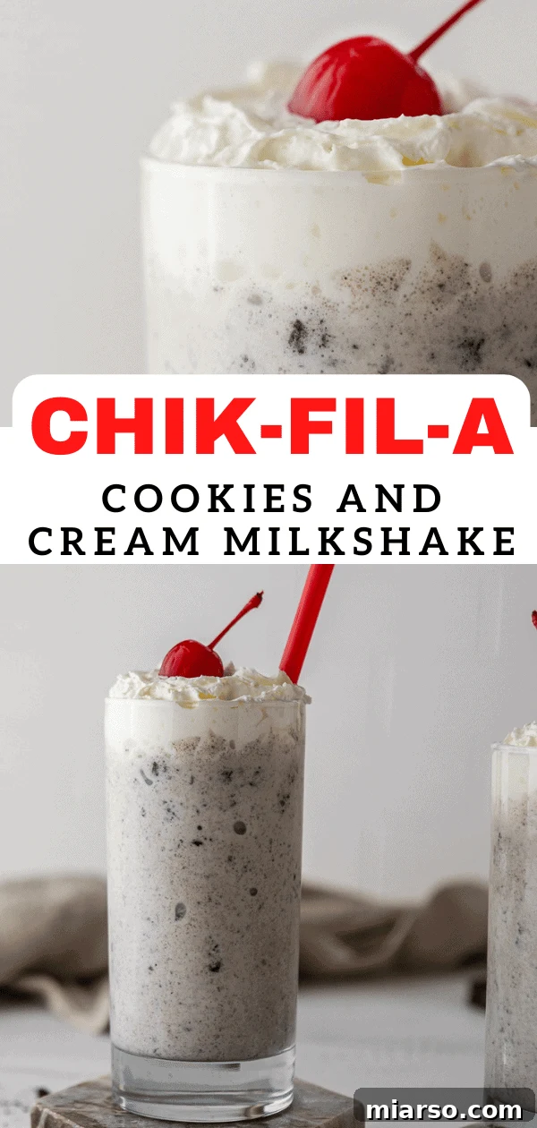 Chick-fil-A Cookies and Cream Milkshake in a glass with whipped cream and cherry